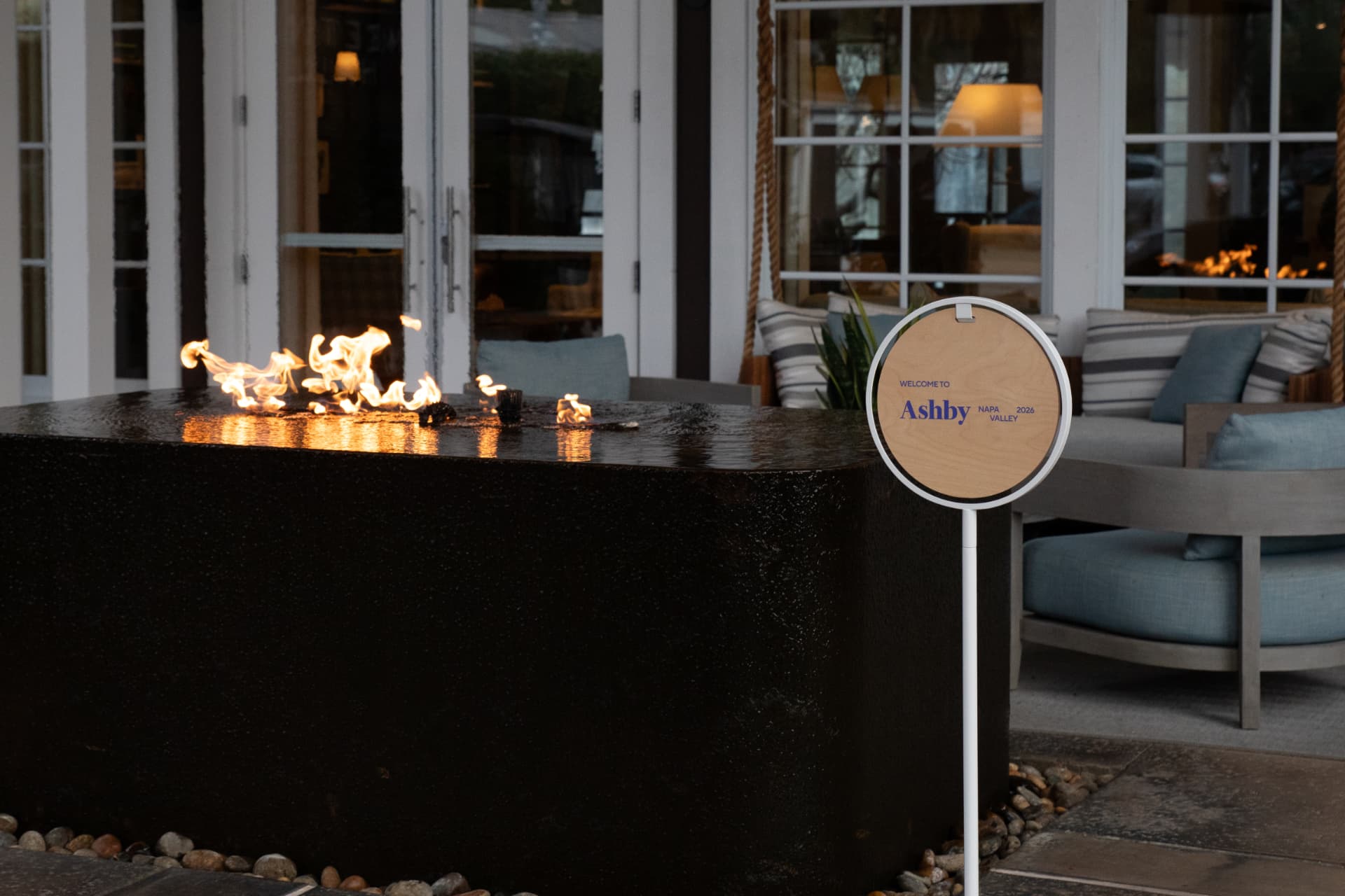 Welcome to Ashby signage by the fire pit